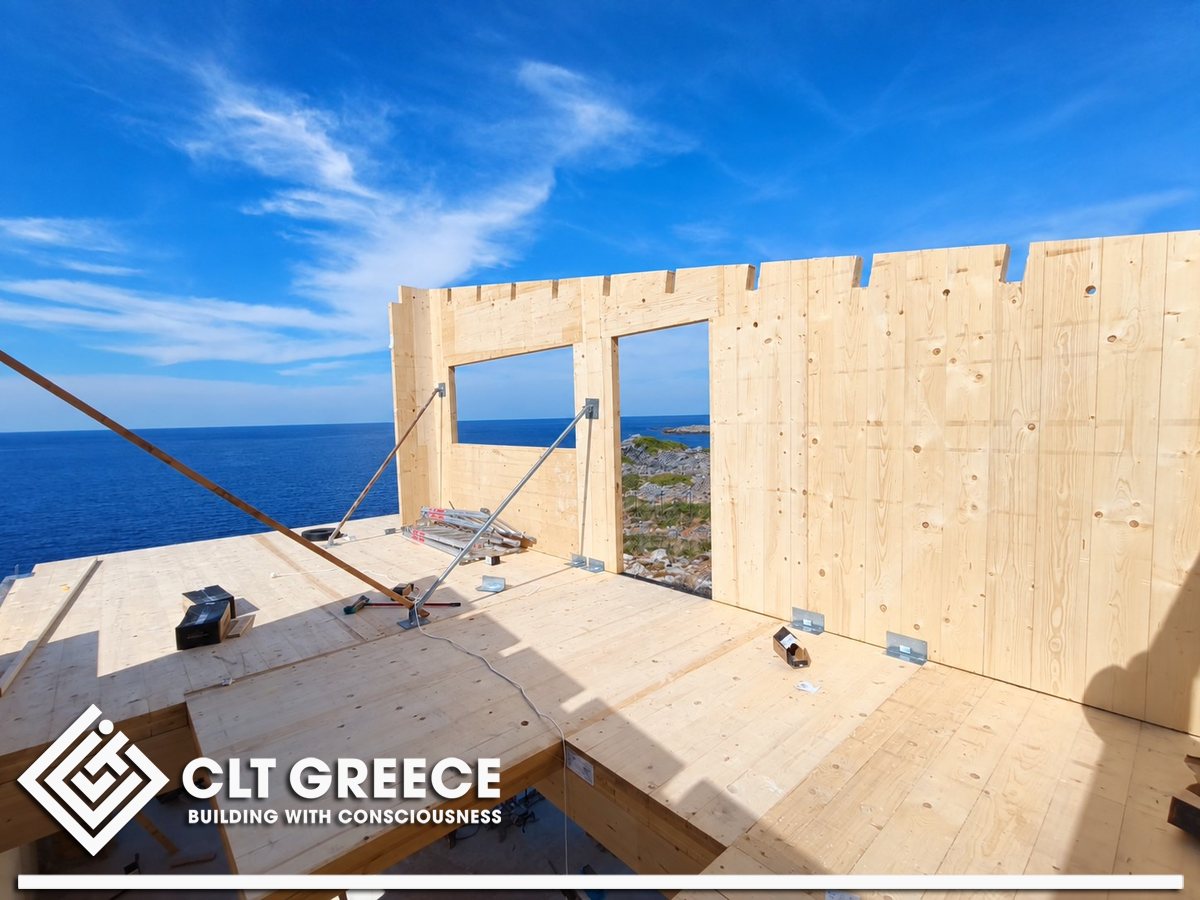 Upper-floor CLT wall with openings towards the Cretan Sea